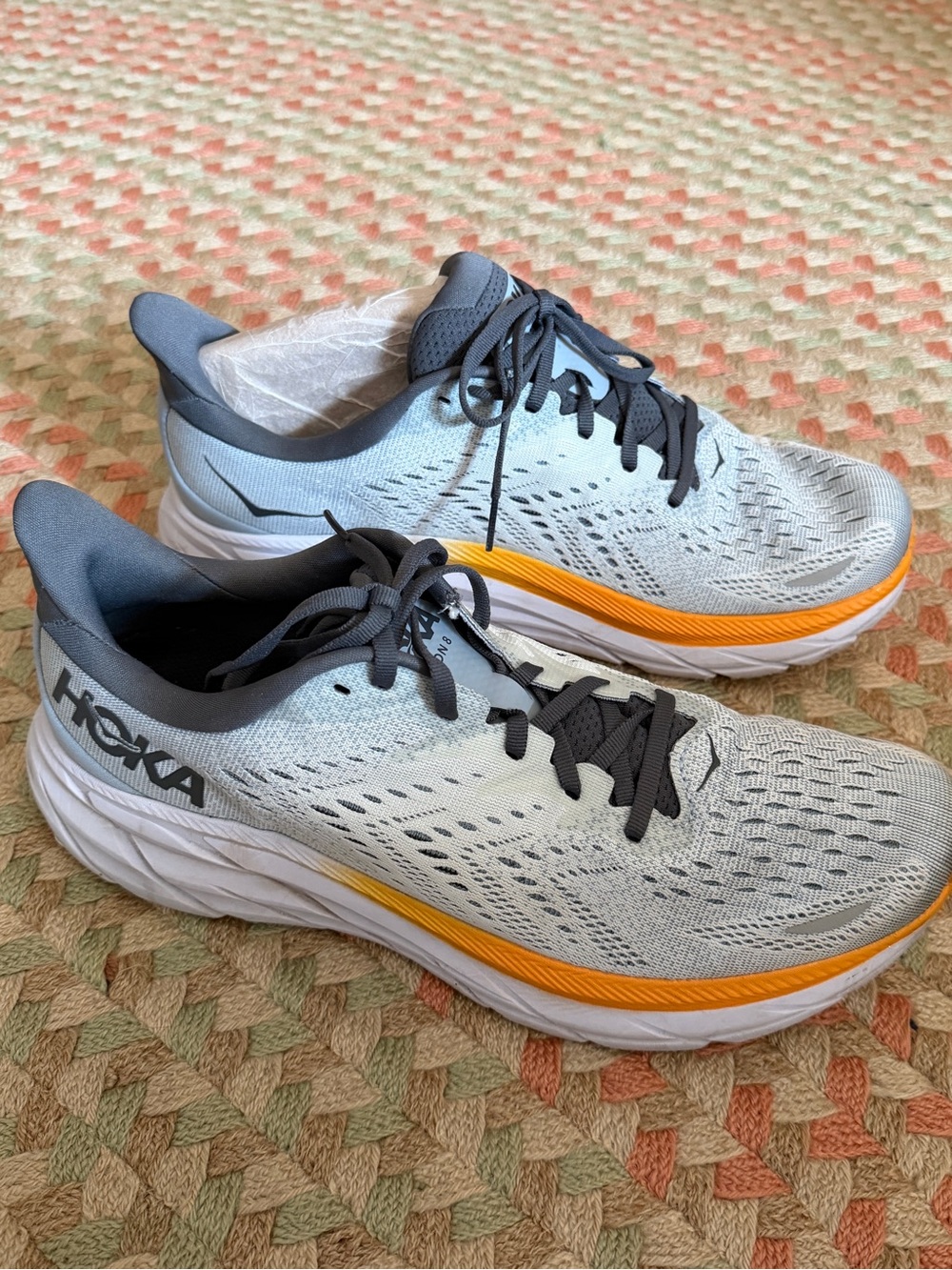 Hoka Men's Light Gray Athletic Shoes with Orange Band